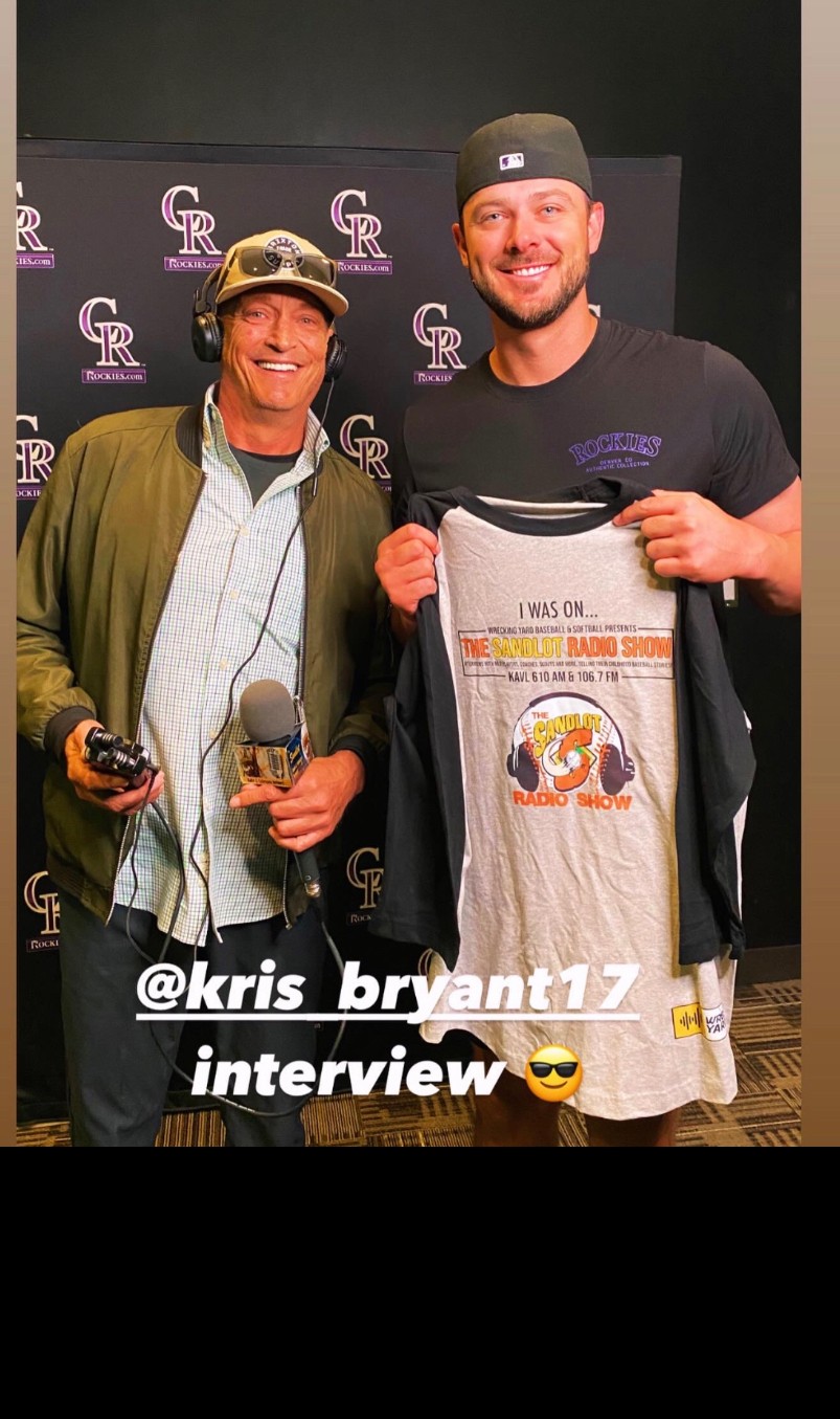 Kris Bryant rocking Sandlot Radio Show gear at Coors Field